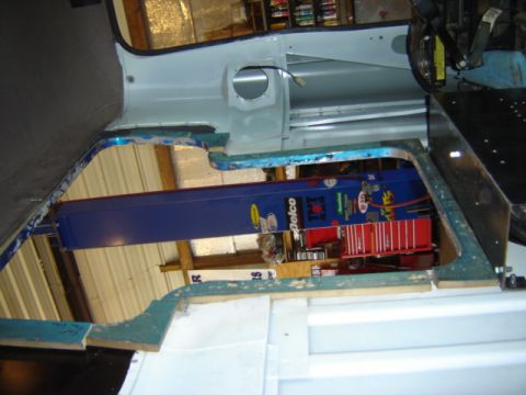 1992 Ford Bronco - Photograph of a truck cab floor area opened up during a rebuild, not a technical document.