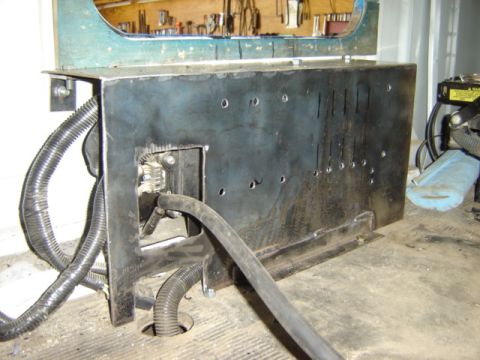 1992 Ford Bronco - Photograph of a custom-fabricated metal enclosure with hoses, not a technical document.