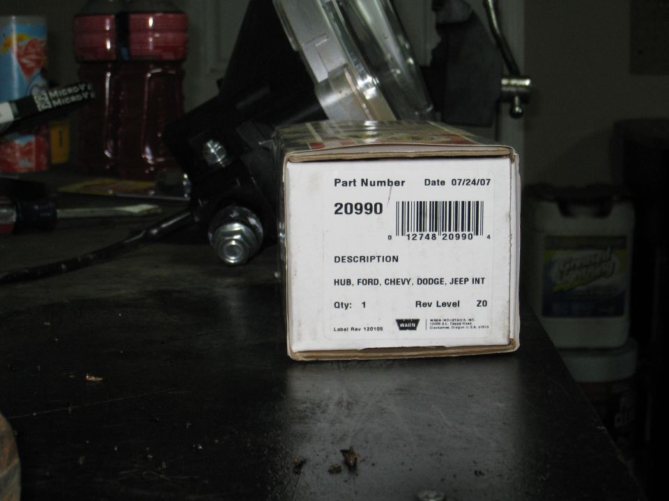 Close-up of a product box with part number 20990 and description HUB, FORD, CHEVY, DODGE, JEEP INT.