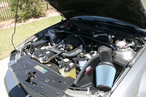 2008 Ford Mustang - Engine bay of a 2008 Ford Mustang, an aftermarket cold air intake system.