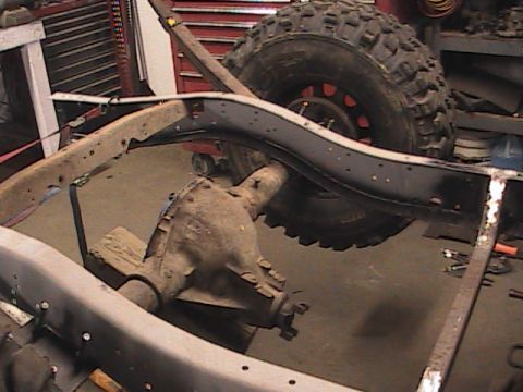 1980 Dodge Magnum - Undercarriage view of a vehicle's frame and drivetrain components, likely undergoing restoration.