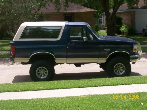 1992 Ford Bronco - This 1992 Ford Bronco is shown in a side profile, lifted with off-road tires.