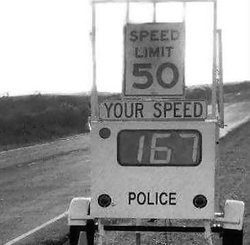 2000 Mercury Grand Marquis - A radar speed sign displays a speed of 167 mph, far exceeding the posted limit of 50 mph.