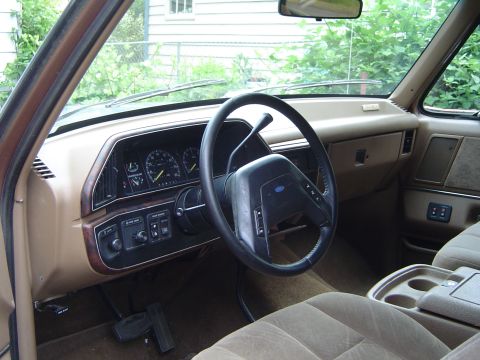 1991 Ford Bronco - Interior view of a 1992 Ford F-Series truck, highlighting the dashboard and seating area.