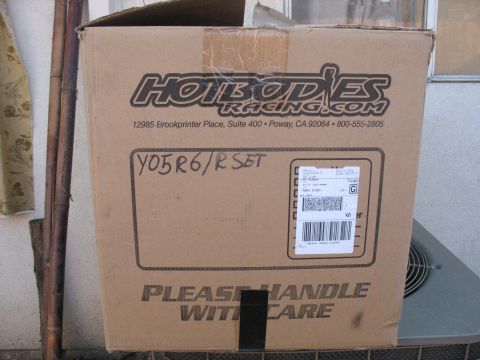 2005 Yamaha R1 - Box contains racing parts, possibly for a 2005 Yamaha R6.