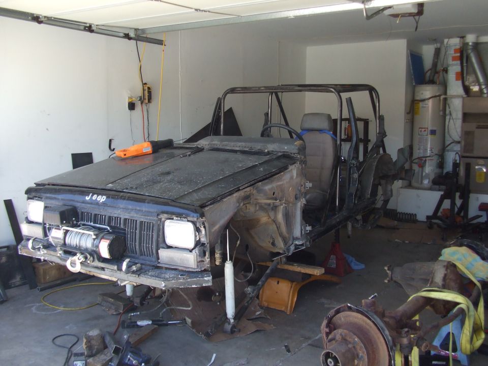 1994 Jeep Cherokee body with winch and roll cage, front view