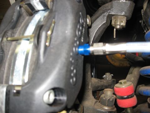 1978 Ford Mustang II - Brake caliper and suspension components are visible in this close-up shot.