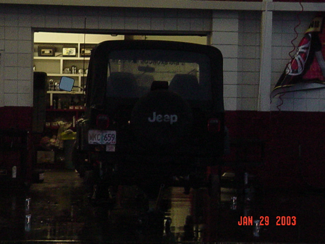 Getting the 33" tires on the Jeep