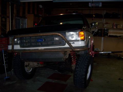 1991 Ford Bronco - Front view of a 1991 Ford Bronco modified with a custom bumper and skid plate.