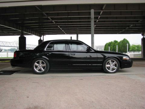 2003 Mercury Marauder - Side profile of a black 2003 Mercury Marauder.