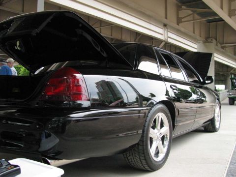 2003 Mercury Marauder - Black 2003 Mercury Marauder with trunk and hood open, parked outdoors.