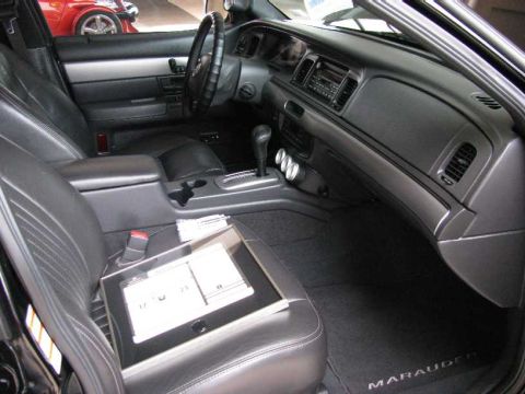 2003 Mercury Marauder - Interior view of a 2003 Mercury Marauder, highlighting its black leather seats and dashboard.