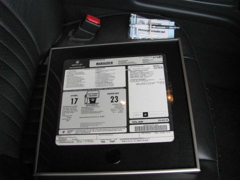 2003 Mercury Marauder - A window sticker for a 2003 Mercury Marauder is displayed on a car's interior surface.