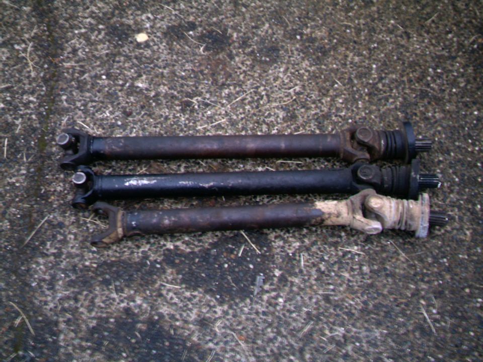 Three front driveshafts The shortest is a shortened shaft for a D-35 conversion on a FM145 transmission application
the middle one is a stock length FM145 shaft, and perfect in length for a D-35 FM146 set up
The long one is a stock length FM146 shaft