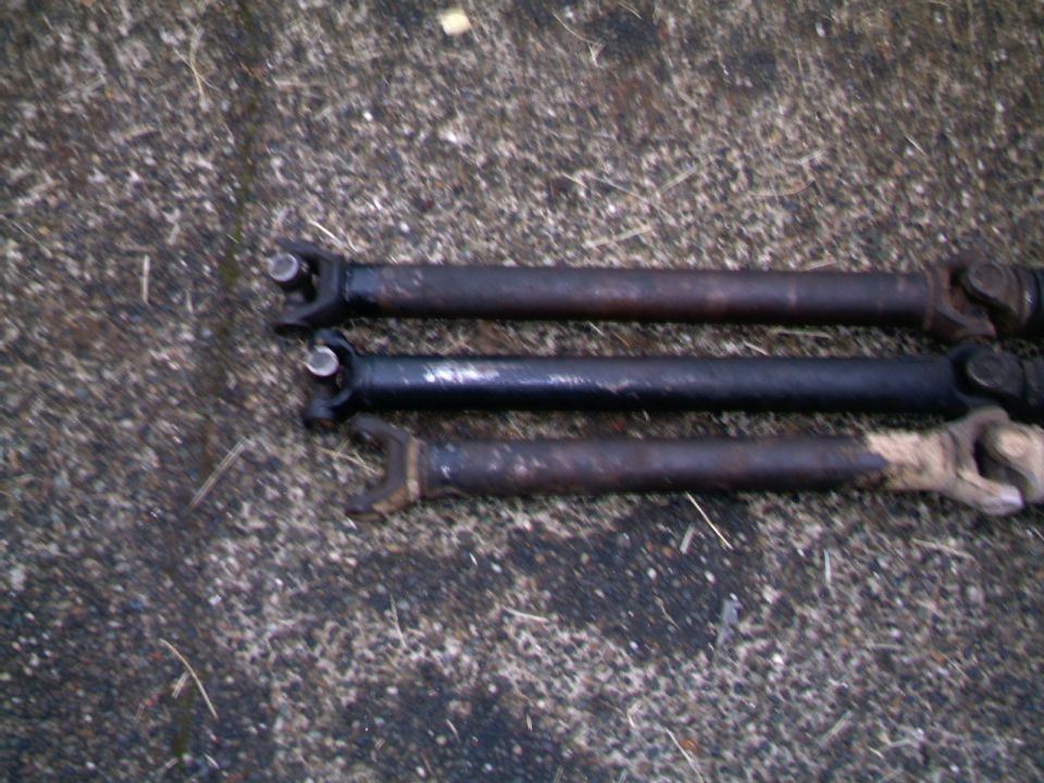 Three front driveshafts The shortest is a shortened shaft for a D-35 conversion on a FM145 transmission application
the middle one is a stock length FM145 shaft, and perfect in length for a D-35 FM146 set up
The long one is a stock length FM146 shaft