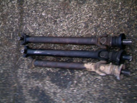 1987 Ford Bronco II - Three front driveshafts The shortest is a shortened shaft for a D-35 conversion on a FM145 transmission application the middle one is a sto…