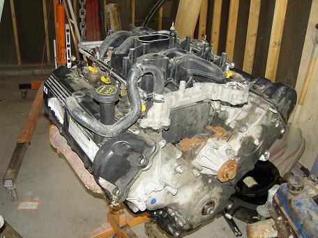 2007 Ford Mustang - Photograph of an engine assembly on a stand, not a technical document.