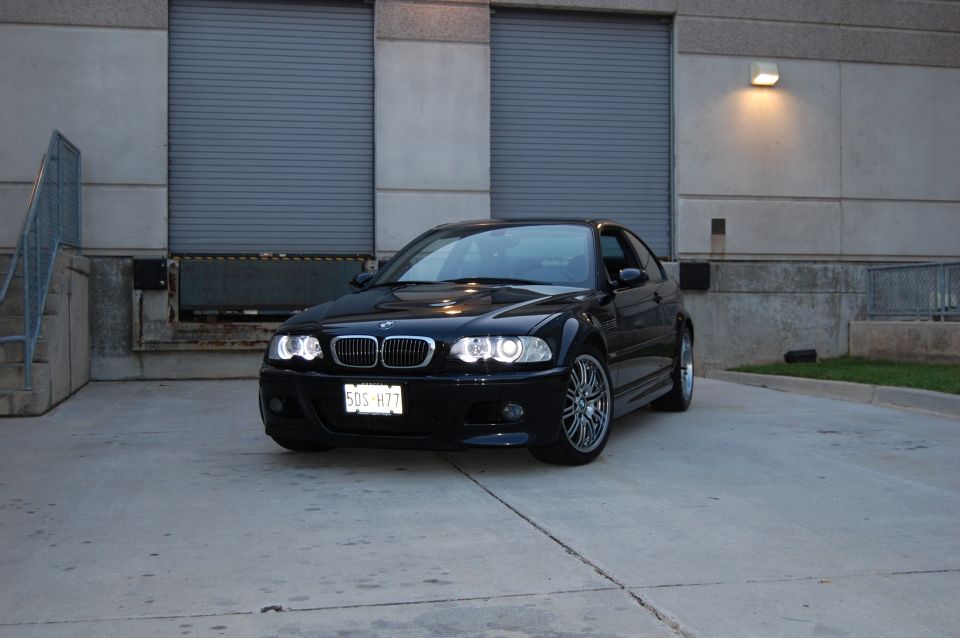 Black 2002 BMW M3 front view with license plate 5DS H77