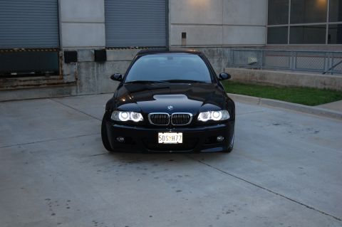 2002 BMW M3 - Front view of a black 2002 BMW M3 parked outdoors.