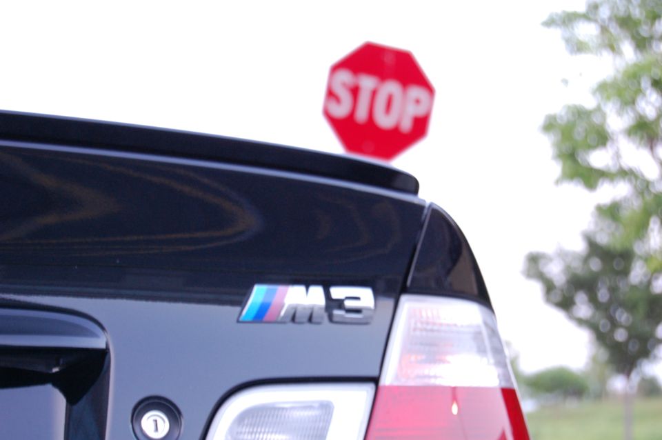 Black BMW M3 emblem on rear trunk, 2002 model