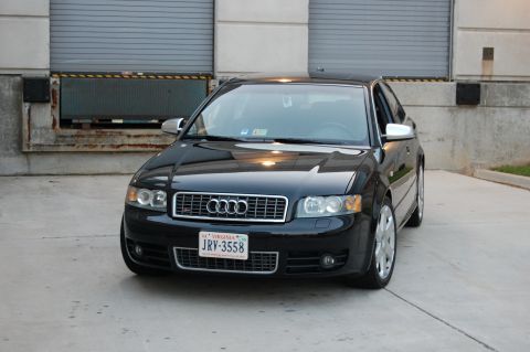 2002 BMW M3 - Front view of a black Audi S4 with Virginia plates parked outside a building.