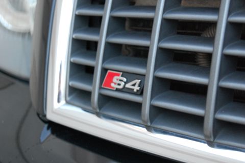 2002 BMW M3 - The grille features an S4 badge, indicating it is an Audi S4 model.