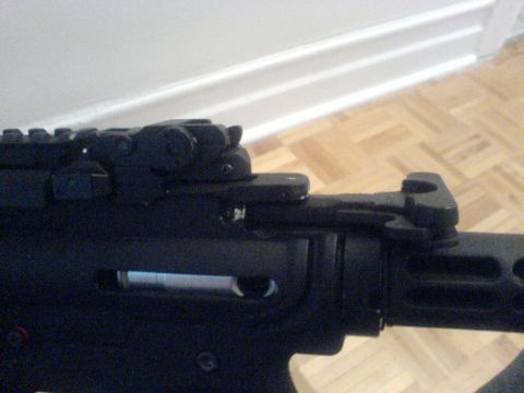 1985 Ford Bronco - Close-up of a firearm receiver, not a 1985 Ford Bronco.