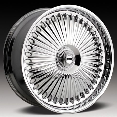1991 Ford Bronco - A single chrome wire wheel with a detailed spoke pattern and a prominent 'DUB' logo in the center.