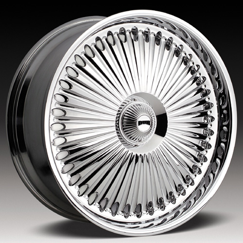 Chrome wire wheel with many spokes and a central cap that says 'DUB'