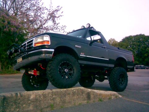 1995 Ford Bronco - This lifted 1995 Ford Bronco features oversized tires and a commanding presence.