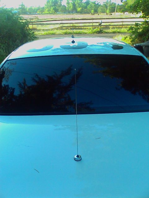 2000 Ford Crown Victoria - Rear view of a sedan with a visible Supermotors.net logo on the trunk.