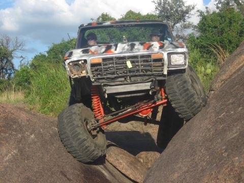 1979 Ford Bronco - This heavily modified 1979 Ford Bronco navigates a challenging rocky terrain.