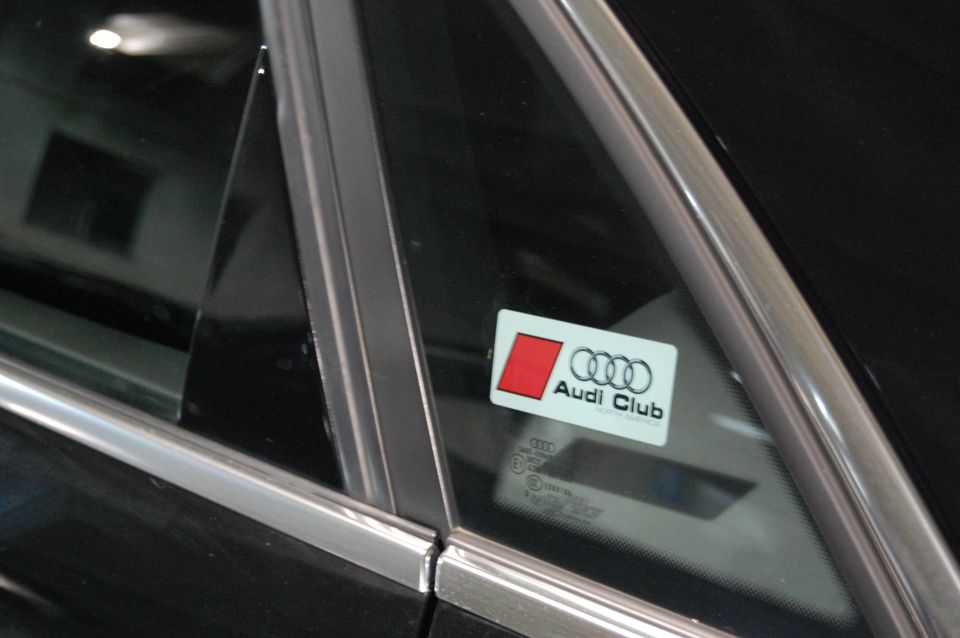 Audi Club sticker on a car's rear side window