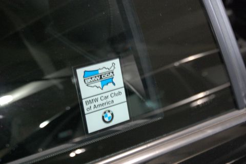 2002 BMW M3 - A sticker for the BMW Car Club of America is visible on the tinted window of a vehicle.