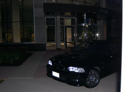 2002 BMW M3 - 2002 BMW M3 parked outside a building at night.