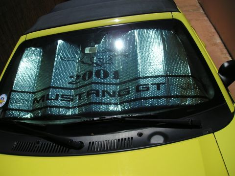 2001 Ford Mustang - Sunshade on a 2001 Ford Mustang GT windshield displays the model year and trim.