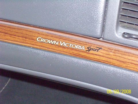 2003 Ford Crown Victoria - Interior trim detail reads 'Crown Victoria Sport' with a date stamp of 06/09/2008 at the bottom.