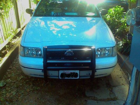 2000 Ford Crown Victoria - Front view of a 2000 Ford Crown Victoria equipped with a push bar.