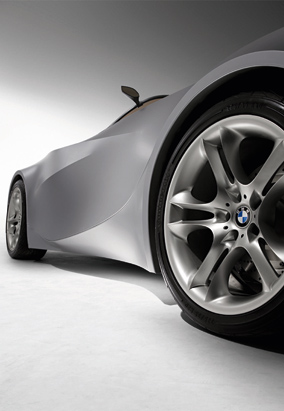 2001 Ford Crown Victoria - A silver BMW concept car is shown from a low angle, focusing on the front wheel and aerodynamic body lines.