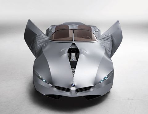 2001 Ford Crown Victoria - This futuristic concept car features striking butterfly doors that open upwards, revealing its interior and advanced design.