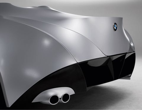 2001 Ford Crown Victoria - Silver BMW concept car rear with dual exhaust and black diffuser details.