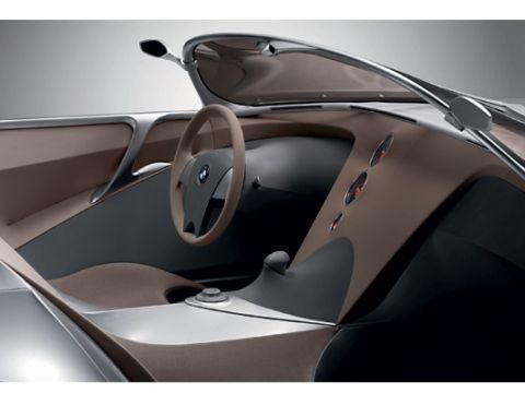 2001 Ford Crown Victoria - The interior of a car shows a modern design with unique dashboard elements and a BMW emblem on the steering wheel.