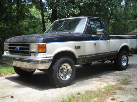 1989 Ford F-150 - This 1989 Ford F-150 pickup truck is shown in a three-quarter front view.
