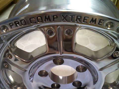 1998 Jeep Cherokee - Close-up of a polished aluminum wheel with "PRO COMP XTREME" text.