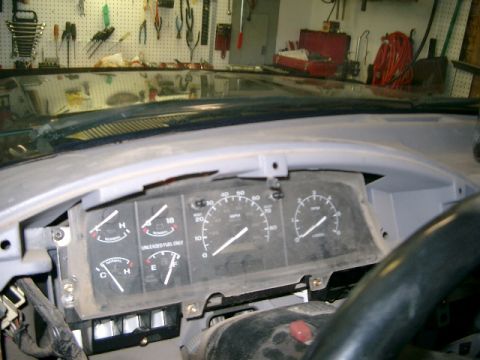 1995 Ford Bronco - Dashboard gauges of a 1995 Ford Bronco, including speedometer and fuel level indicator.