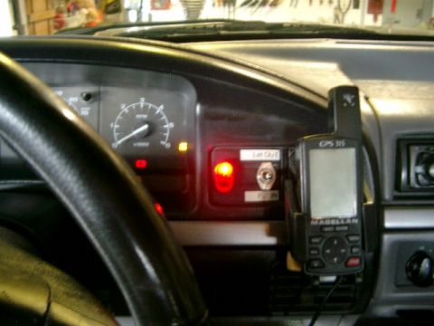 1995 Ford Bronco - Interior view of a 1995 Ford Bronco, a Magellan GPS 315 device mounted on the dashboard.