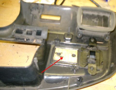 1995 Ford Bronco - Dashboard part, possibly from a Ford Bronco, with an air vent and mounting hardware visible.