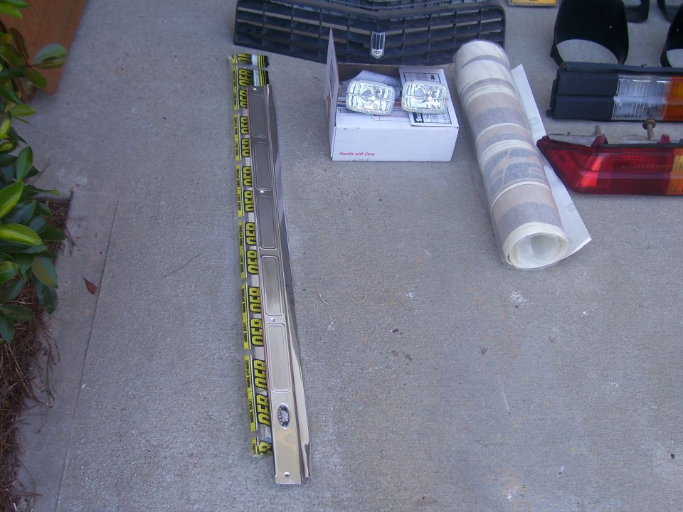 Chrome trim piece with yellow caution tape