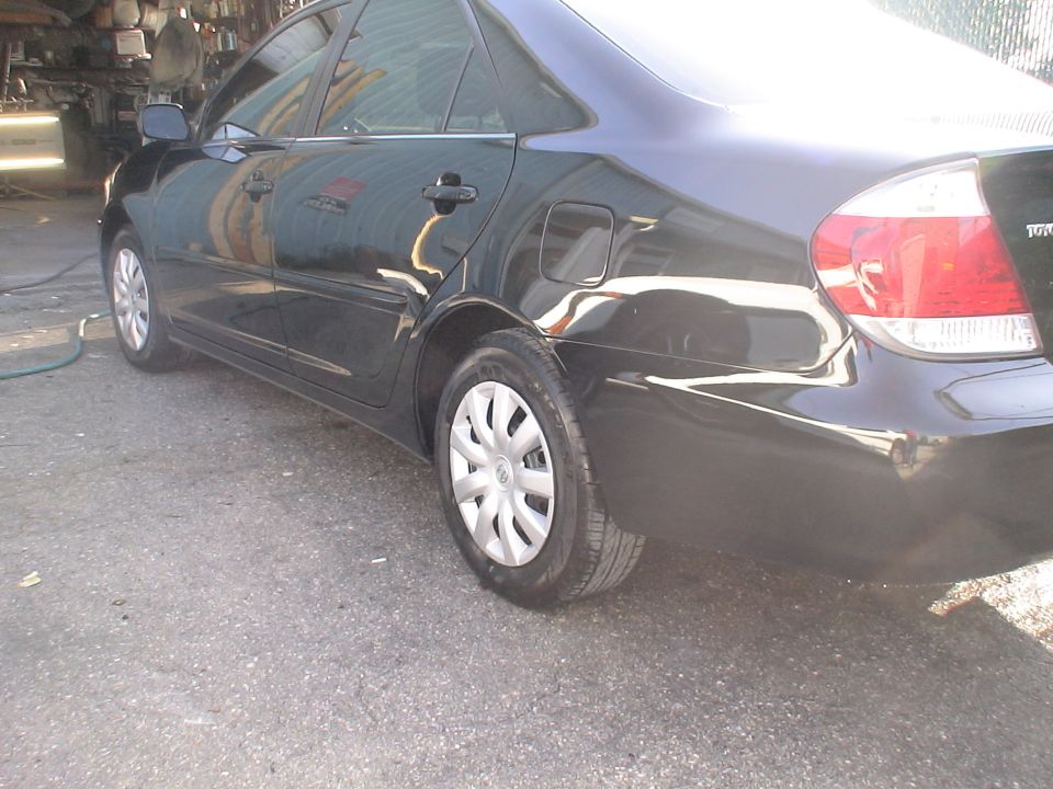 Black sedan side view
