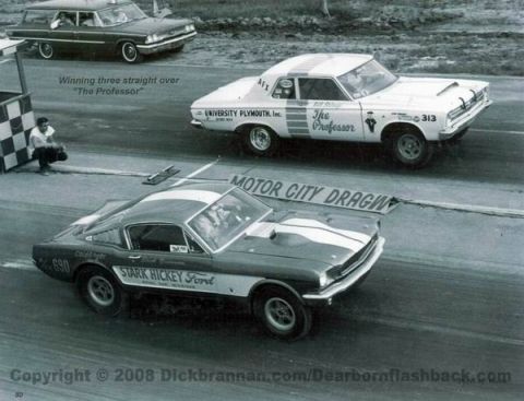 1972 Ford Ranchero - Two drag cars compete on a track, with a station wagon in the background.